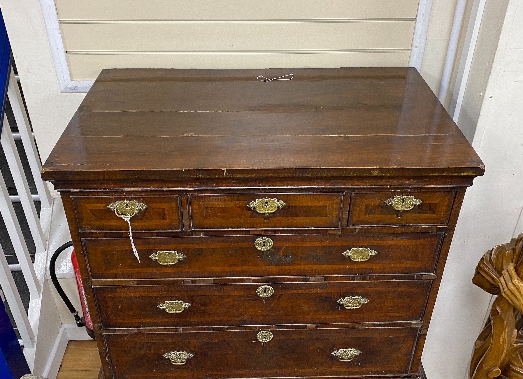 An 18th century and later banded walnut chest on stand, width 99cm, depth 56cm, height 138cm